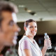 Woman smiling with water bottle